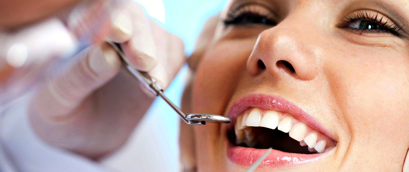 A patient smiling during a check-up